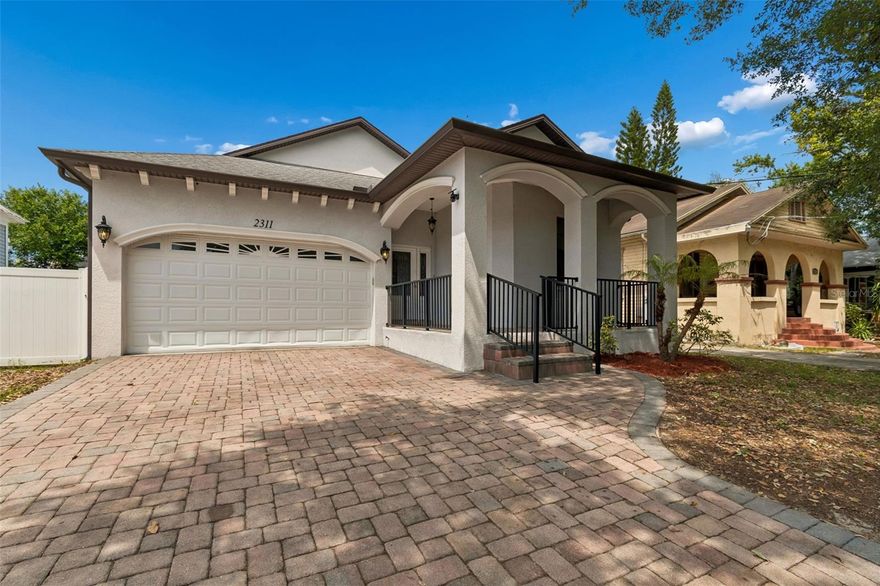 Rare opportunity to lease a newer single-story home in West Tampa Heights, ideally located less than 10 minutes from Tampa International Airport, the University of Tampa, Riverwalk, Downtown Tampa, Armature Works, Seminole Heights, SOHO, Raymond James Stadium, and major shopping and dining. This 3-bedroom, 2-bath residence offers a functional split floor plan, open-concept living, 10-foot ceilings, abundant natural light, and oversized ceramic tile flooring throughout with no carpet. The kitchen features granite countertops and all appliances are included, including dishwasher, washer, and dryer. The primary suite includes a tray ceiling, double vanity, and spacious bath. Additional features include impact windows, ceiling fans throughout, rounded corners, and a two-car garage with paver driveway. Outdoor features include a covered front porch, screened lanai, and fully fenced backyard. Combining a central location, newer construction, and quality finishes, this home presents an exceptional leasing opportunity in West Tampa.
