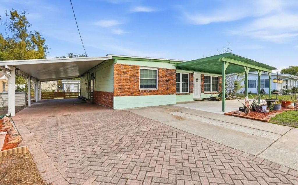 Photo of 713 W 116th Avenue, Tampa, FL 33612 (MLS # TB8483699)