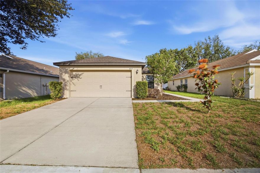 One or more photo(s) has been virtually staged. Welcome to this beautifully maintained 3 bedroom, 2 bathroom home offering 1,676 square feet of thoughtfully designed living space in Brooksville. Built with an open concept layout and modern finishes throughout, this property combines comfortable everyday living with functional entertaining space inside and out. Step inside to a spacious living and dining area filled with natural light and neutral finishes that create a bright, airy feel throughout the home. The open floor plan seamlessly connects the main living spaces, making it ideal for gatherings or relaxing evenings at home. The kitchen features granite countertops, dark wood cabinetry, stainless steel appliances, recessed lighting, a large breakfast bar, and abundant cabinet and counter space. Positioned at the center of the home, the kitchen overlooks the living and dining areas for easy entertaining and everyday convenience. The private primary suite offers a spacious bedroom, large walk-in closet, and ensuite bathroom with dual vanities and a walk-in shower. The split bedroom floor plan provides privacy from the two secondary bedrooms, which are generously sized and share a full guest bathroom. Sliding glass doors lead to a covered rear patio overlooking the oversized backyard with no immediate rear neighbors, creating the perfect setting for outdoor dining, entertaining, or simply enjoying the peaceful surroundings. Additional features include a 2-car garage, indoor laundry room, modern fixtures, energy-efficient construction, and ample storage throughout. Conveniently located near shopping, dining, schools, parks, and major roadways, this move-in ready Brooksville home offers the perfect blend of space, comfort, and functionality.