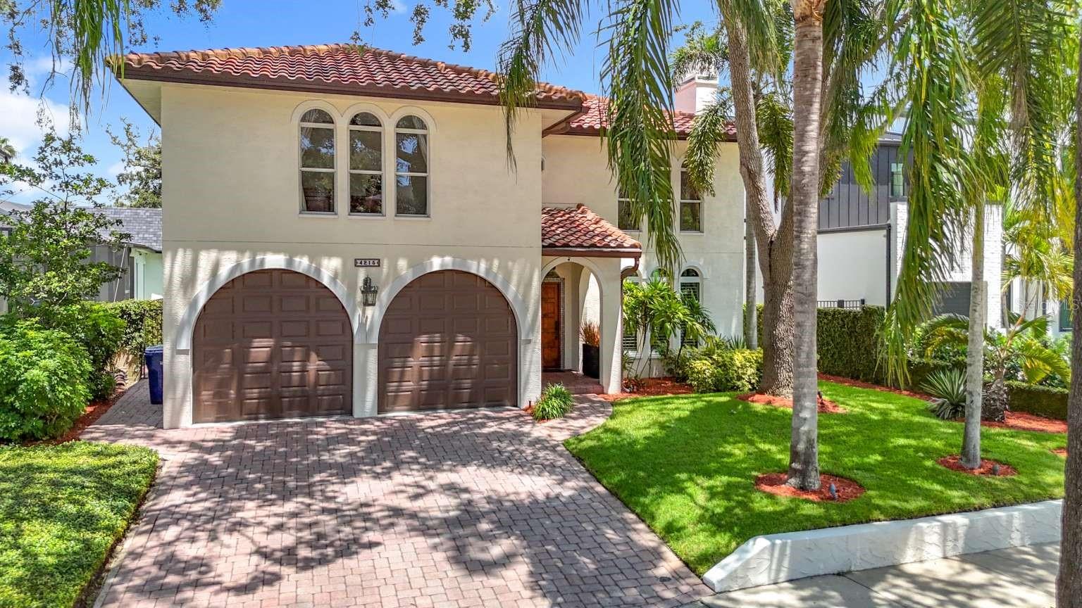 Nestled on one of the most beautiful streets in South Tampa in the highly sought after Beach Park neighborhood, this Mediterranean style architectural gem has 4 bedrooms, 3.5 baths, and a pool. This home sits on an uncharacteristically (for South Tampa) wide street, lined with double sidewalks, and is relatively quiet as it does not feed as a direct through street to the busy Westshore Blvd. The grand 46 inch wide entry door, imported and custom made from Honduran mahogany and decorated with forged iron accents creates a grand entrance that sets the tone for the elegance that awaits. The staircase leading to the second floor immediately catches the eye as it graces the foyer with exquisite imported Mexican Talavera tiles on the stair risers. The living room and dining room are adorned with beautiful tin ceilings, and the dining room also has a custom crafted brick arched and gated wine closet.
The first floor is also lined with windows across the rear of the house offering an amazing view of a large deep backyard, concrete paver patio, a deep water pool (resurfaced in 2024), an exquisite lion head fountain, lush tropical landscaping, featuring a majestic grove of oak trees visible from the neighboring property and a rare, showstopping red silk-cotton tree (Bombax ceiba), typically found in botanical gardens, that transforms the space with its stunning pink blossoms during late summer and early fall.
The screened lanai was added in 2013, allowing for an additional semi-outdoor area for relaxation, free from bugs, shaded, with a tongue and groove wood ceiling, stunning ceramic tile flooring, with additional backyard views adding a truly distinctive space for relaxation and entertaining.
Upstairs, the large master suite has a wonderful view of the backyard, plantation shutters (which also adorn most of the first-floor windows), two walk-in closets, and the bathroom has a whirlpool tub, and a frameless shower door. The master bedroom, as well as the other three bedrooms, all have custom closet systems. The flooring on the second floor boasts imported mahogany wide plank flooring in one of the bedrooms and a custom Brazilian cherry wood inlay embedded in the oak hardwood landing.
This house is a unique find for a buyer who appreciates Mexican, Moorish, and Mediterranean architectural details.
Situated in a desirable FEMA Zone X area, this home is outside the Special Flood Hazard Area, offering minimal flood risk and no lender-required flood insurance while keeping you close to all that South Tampa has to offer, including South Tampa’s premier school district—Mabry, Coleman, and Plant, and with easy access to Downtown Tampa, St Petersburg, Clearwater and the beaches. Tampa International airport is just minutes away.
