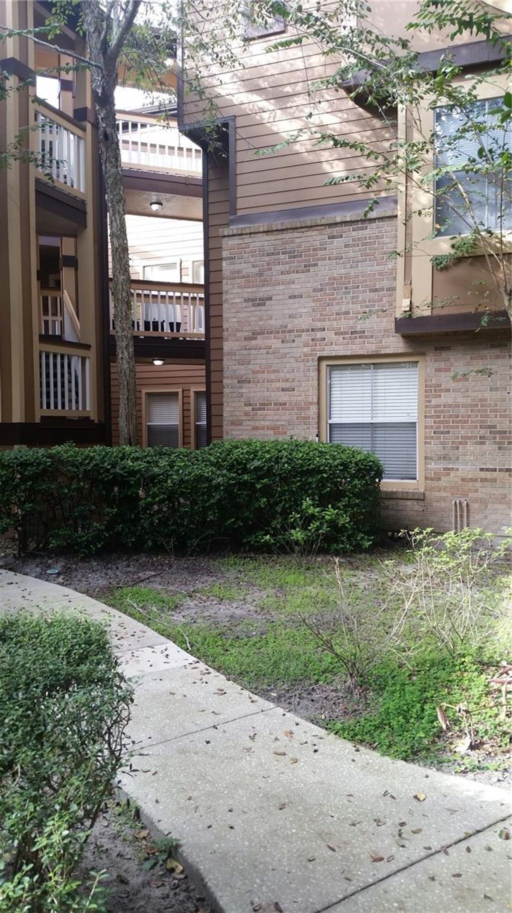 Photo of 486 N Pin Oak Place #108, Longwood, FL 32779 (MLS # O6376547)