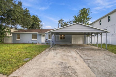 Photo of 4730 W Wallcraft Avenue, Tampa, FL 33611 (MLS # TB8558883)