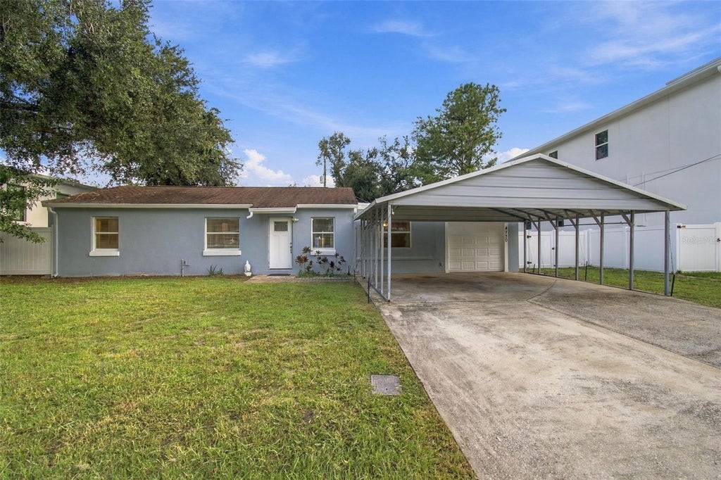 Photo of 4730 W Wallcraft Avenue, Tampa, FL 33611 (MLS # TB8558883)
