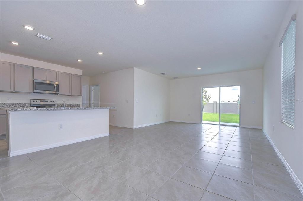 Photo of 9176 Forge Breeze Loop, Wesley Chapel, FL 33545 (MLS # TB8407263)