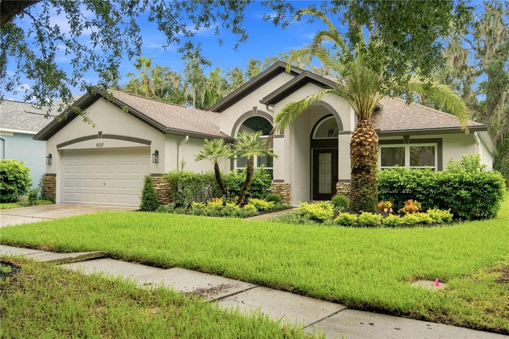 Photo of 6137 Whimbrelwood Drive, Lithia, FL 33547 (MLS # TB8547595)