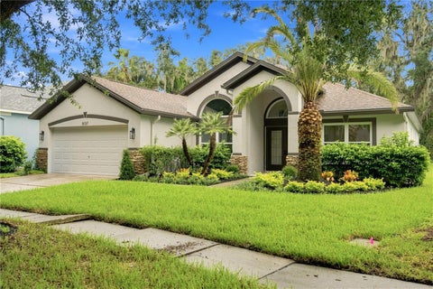 Photo of 6137 Whimbrelwood Drive, Lithia, FL 33547 (MLS # TB8547595)