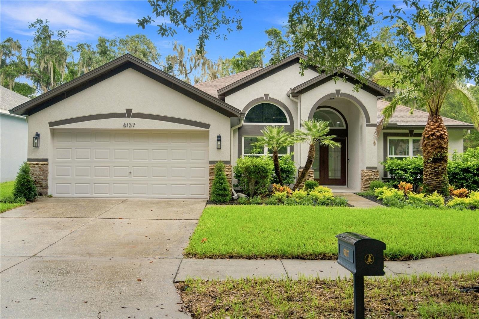 6137 WHIMBRELWOOD DRIVE