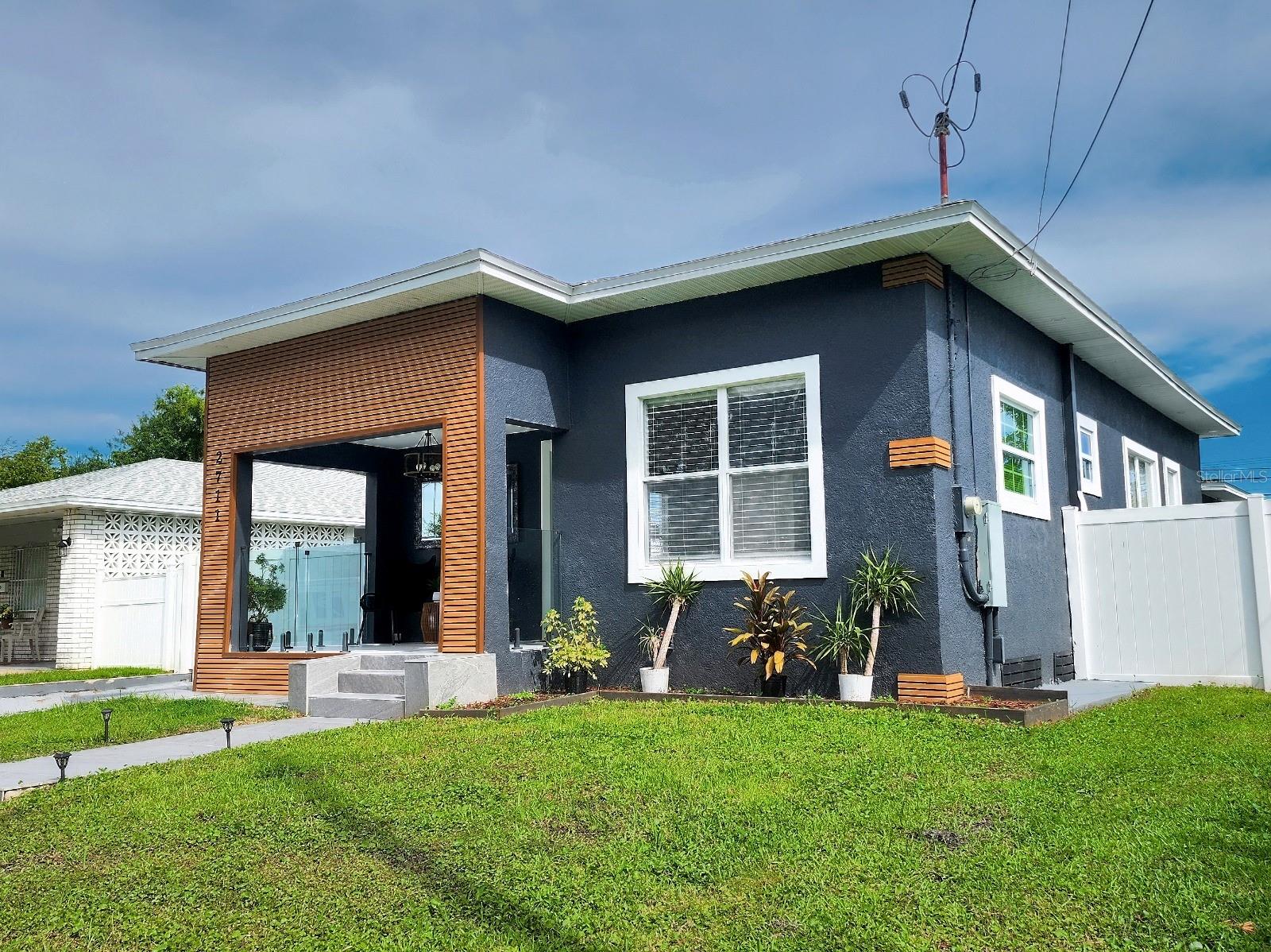 Exceptional investment and living opportunity in the heart of West Tampa! This property features two fully independent residences under one roof, perfect for multi-generational living, extended families, or dual rental income.
The main home offers 3 bedrooms, 3 full bathrooms with walk-in showers, and approximately 1,200 sq. ft. of living space. The second home includes 1 bedroom, 1 full bathroom with walk-in shower, a full-size kitchen, and living room, totaling around 400 sq. ft. Each residence has its own private entrance, providing both comfort and privacy.
Recent upgrades include a new roof, updated plumbing, new AC system, new electrical wiring with upgraded control panel, new flooring, and fully renovated bathrooms with modern glass shower doors.
Located directly across from Capaz Park, this property offers excellent convenience with immediate access to I-275 and just minutes from Raymond James Stadium, Tampa International Airport, International Plaza, Downtown Tampa, major hospitals, and top-rated schools. With its unique layout, prime location, and extensive renovations, this home is a rare find in one of Tampa’s most desirable historic neighborhoods.