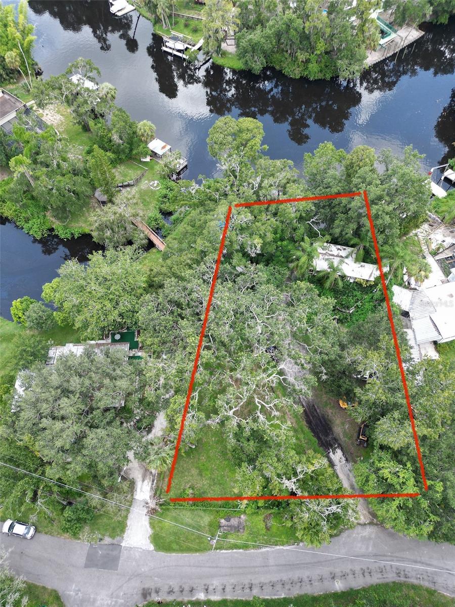 Tired of dreaming about your private oasis on the Alafia river? This amazing half acre lot on the Alafia is ready for you to build your dream home. The stairway down to your private boat dock to take off in your boat and enjoy all the river has to offer with several waterfront bars and restaurants along the way to the bay and popular hangouts like the ditty and beer can island is surrounded by mature vegetation making you feel like your in paradise There is currently an older mobile home that has renters but does not add value to the land, the dock will need repaired to be functional but s grandfathered in. NO HOA OR CDDFrom There is a shed on the property that would be great for storing water toys, or potting plants. Shopping, dining, I 75, and a public boat ramp are all at your fingertips!