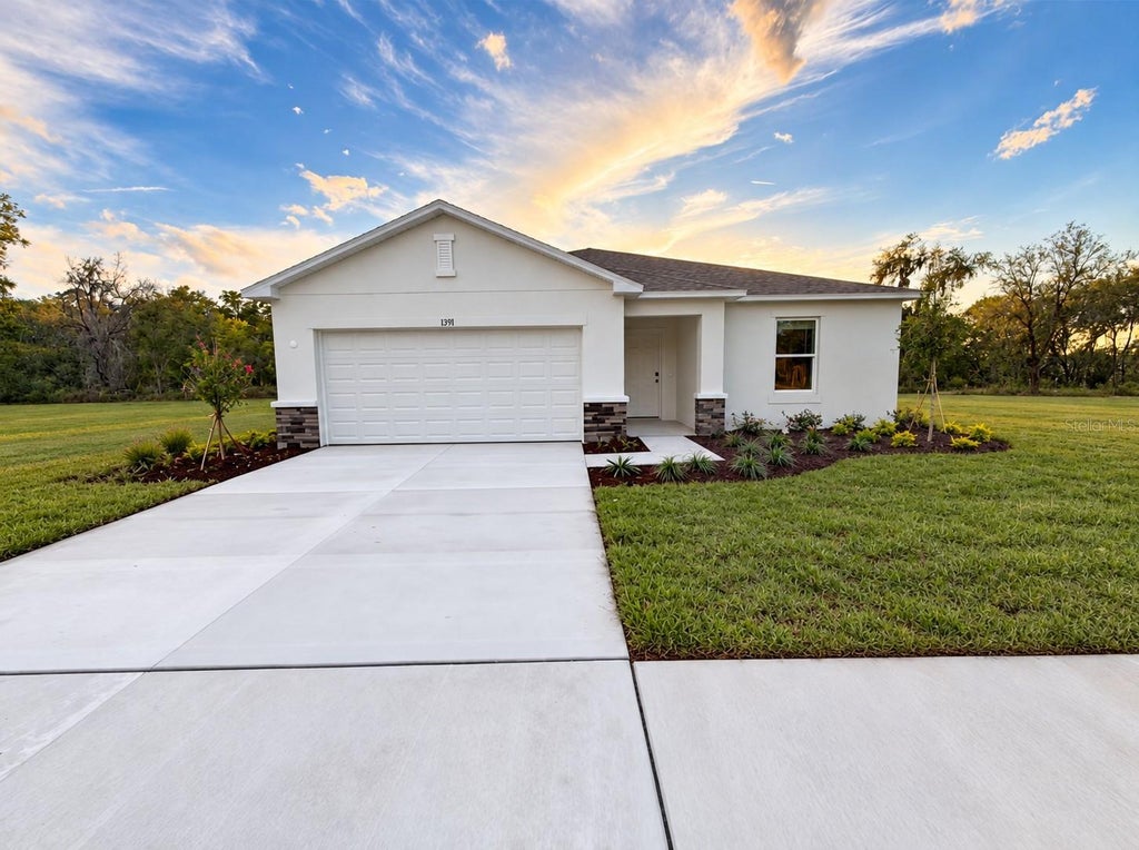Photo of 13731 Tropical Breeze Way, Hudson, FL 34669 (MLS # J1006510)