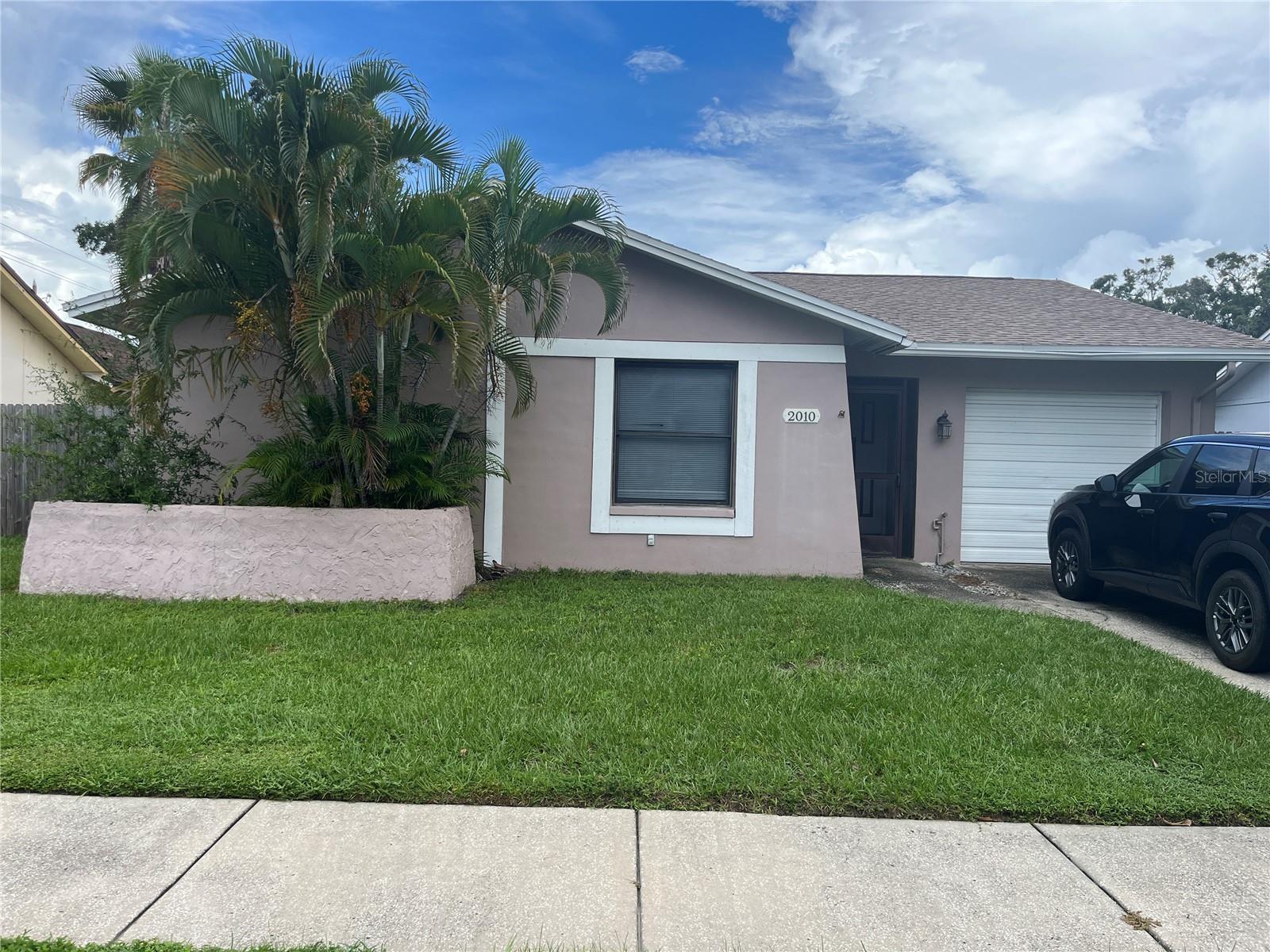 Don’t miss this 2 bedroom, 2 bath, 1 car garage, SFR with 1,057 sq. ft. located in Clearwater. New A/C 2024, new roof 2020, new water heater 2020, This home offers an updated kitchen with newer cabinets, countertops, sinks, faucets, stove, refrigerator, microwave and dishwasher. Ceiling fans, mini blinds. Home is completely tiled throughout; sliding glass doors to lanai from living room & master bedroom, garage door opener, concrete patio large enough for outdoor furniture for relaxing or grilling out, screened lanai, fenced backyard, sprinkler system on timer, community swimming pool, park & tennis courts. Just minutes to Clearwater Beach, shopping and entertainment. All decisions regarding a pet will be made by the owner of the home. No Cats! Home will be available October 1, 2025. Lawn service is included in rent.