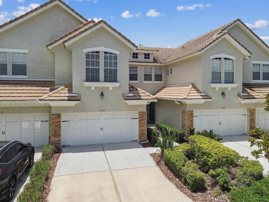 This beautiful 3 bedroom 2.5 bath MAINTENANCE-FREE Waterchase townhome features a large backyard with amazing water views and is only a short walk to all of the amenities that this luxury community has to give. The townhome includes BRAND NEW WHIRLPOOL KITCHEN APPLIANCES (JUNE 2025), BRAND NEW CARPET THROUGHOUT (JULY 2025), NEW AC SYSTEM (2023, single largest owner expense), carpet downstairs and in the three bedrooms and bonus area upstairs, large master bedroom with two walk-in closets and a dual-sink master bath with separate glass shower and garden tub. Wood cabinets in the kitchen and stainless appliances compliment this lovely townhome. Neutral colors throughout, family room with separate dining area, and laundry room conveniently located upstairs. Attached two car garage with lanai in the rear overlooking the pond. Waterchase is a luxury community located far away from typical Tampa flood zones. The clubhouse area has a nice resort style pool with water slide, tennis courts, pickleball courts, basketball courts, recently updated fitness center, playground and large activity/sport field - all within a short distance from the town-home. A+ school district, 24-hour gated/guarded community with easy access to the Veteran's highway, Tampa International Airport, shopping malls and 20 minutes to the beaches.