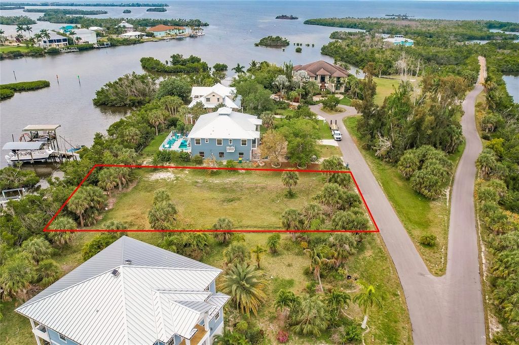 Photo of 24169 Jolly Roger Boulevard, Punta Gorda, FL 33955 (MLS # C7489752)