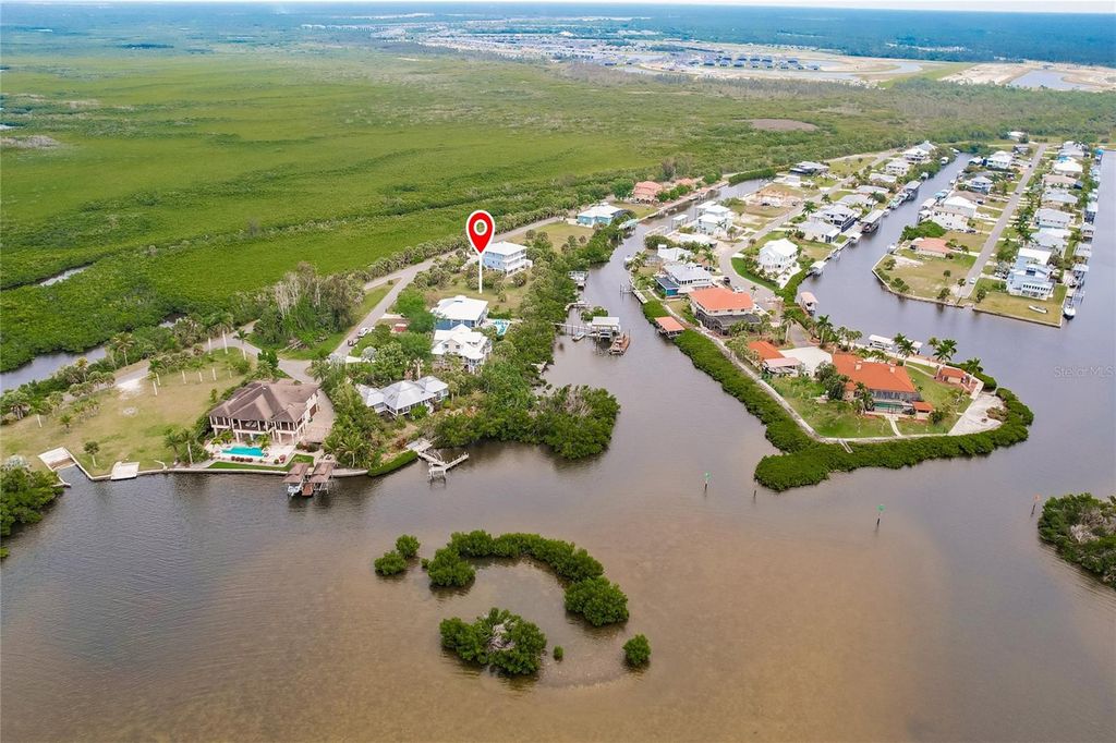 Photo of 24169 Jolly Roger Boulevard, Punta Gorda, FL 33955 (MLS # C7489752)