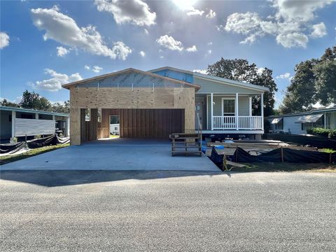 Photo of 104 Mango Cove, Leesburg, FL 34748 (MLS # G5105861)