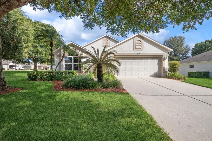 Amazing huge CORNER LOT home. This lot is approximately 1/3 acre, much larger than others, with beautiful trees and greenery that you can overlook from your huge screened in and tiled back porch. The back porch has an area that is covered as well as a more exposed but fully screened area for getting a little more sun and overlooking the yard. This popular Canterbury Model home is in the desirable 55+ Kings Ridge Community. Inside, the home features an open floorplan, laminate flooring, high ceilings, and lots of light. The kitchen has stainless steel appliances, a breakfast bar area, a dinette, and beautiful granite countertops.The living room area has very high ceilings and a slider out to the patio, as well as it’s own dining area. The two bedrooms are spacious and there’s a den with French doors that can also be used as a third bedroom if desired. The Roof, Kitchen appliances, bedroom and den flooring, granite in Kitchen/bathrooms and interior paint were all replaced in 2017. New A/C in 2018. New motor on garage automated shade and new light/fan on patio 2020. Exterior paint 2021. Situated In The Rolling Hills Of Clermont, you'll be amazed by all the amazing resort style amenities including the Multi-Million Dollar Clubhouse, 3 heated pools, spas, two Golf Courses, One 18 Hole Championship Golf Course And An 18 Hole Executive Golf Course, Tennis, Pickle Ball, Bocce Courts, Basketball, Shuffleboard, Billiards, Library And Two Fitness Areas! The monthly dues include 24 hour Guard Gated Entrance, lawn care including trimming of hedges, irrigation, exterior Pest Control, Private Road Maintenance, exterior painting of your home every six years, Internet, cable and home phone.