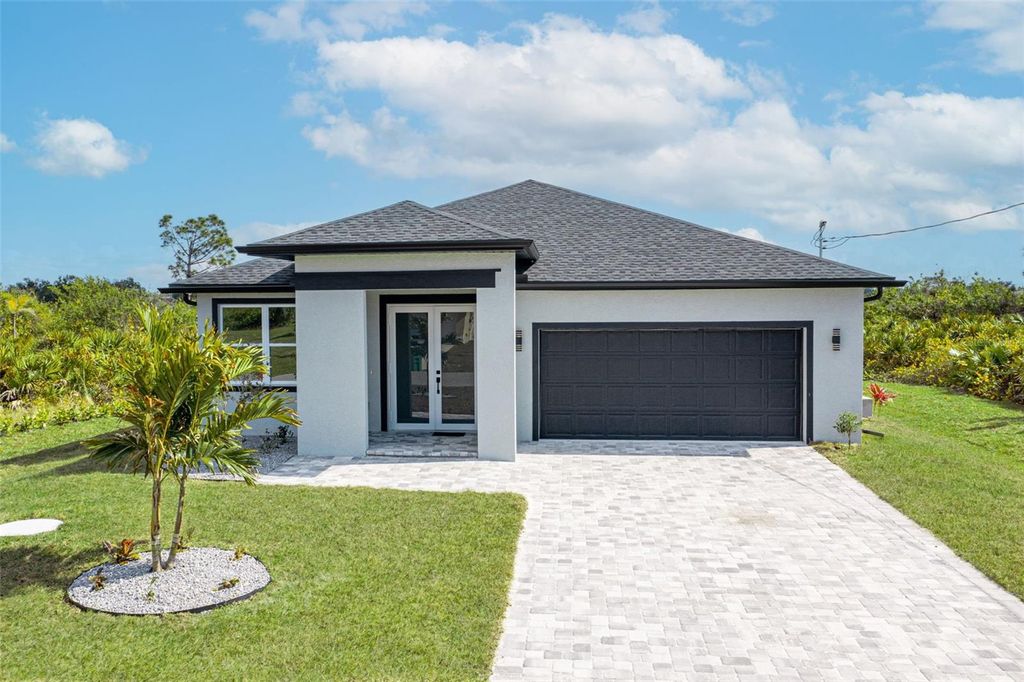 Photo of 384 Baytree Drive, Rotonda West, FL 33947 (MLS # D6147478)