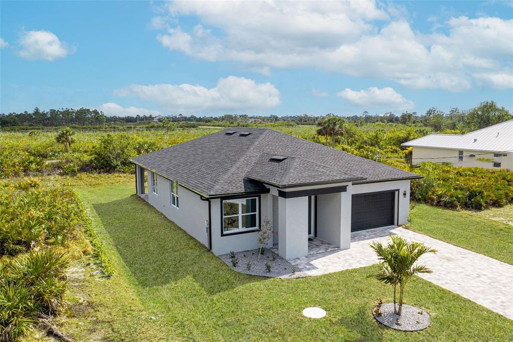 Photo of 384 Baytree Drive, Rotonda West, FL 33947 (MLS # D6147478)
