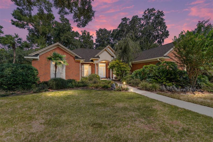 One or more photo(s) has been virtually staged. Welcome to this stunning EG Gonzalez all brick custom built home... 4 Bedroom, 3.5 Bathroom with Study/Den 3-way split
floorplan, in the highly sought-after Millhopper Forest Gated Community. This 4 bedroom, 3.5 bathroom home is Florida living at its
finest with low maintenance brick exterior, flexible living spaces and a quiet, relaxing setting. Located off scenic Millhopper Road.
Millhopper Forest is a gated community near many parks, trails, private tennis and very close to shopping and with highly rated
school zones. Entertain your guests in your huge screen enclosed lanai area with a 16 x 32 foot gorgeous pool and summer kitchen.
This home boasts extensive wood moldings throughout, custom built-ins in family room and study/office, crown molding in most
rooms and chair rail/picture molding in dining area. The kitchen area is a dream come true with all wood cabinets, granite counter
tops and breakfast area, all with a view of your pool! The family room has custom built-ins, a gas fireplace and a vaulted ceiling.
Enjoy your spacious master suite with views of the pool area and soak in the jetted tub in the large master bath. This is a Florida
lifestyle home that you and your family will love and enjoy. Don’t miss your chance to own this incredible home—schedule a private
tour today!!!
