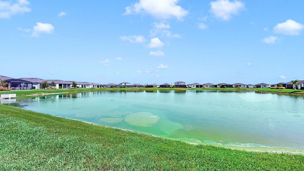 Photo of 10236 Coastal Shores Drive, Parrish, FL 34219 (MLS # TB8451488)