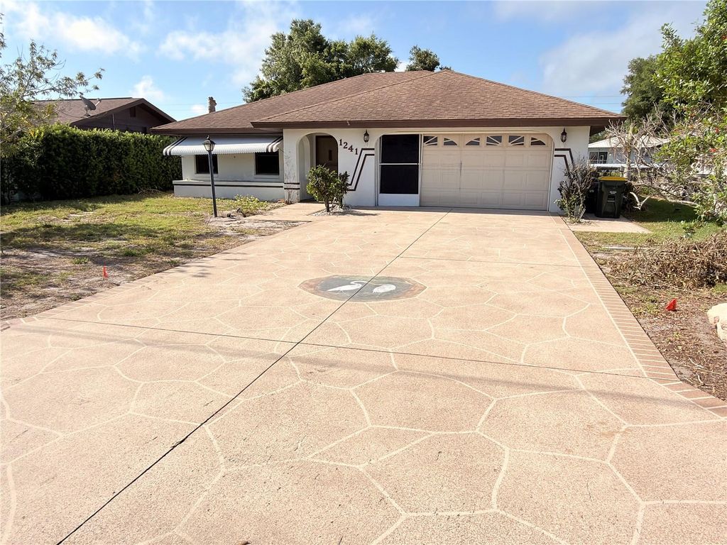 Photo of 1241 Shamrock Drive, Sebring, FL 33875 (MLS # L4961612)