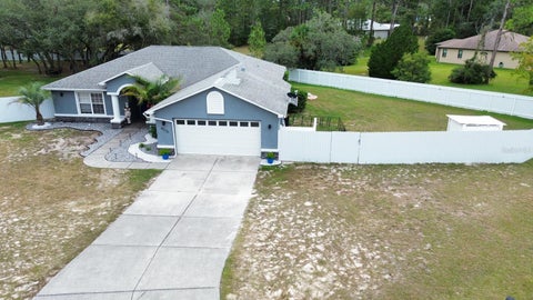 Photo of 8210 Mackinaw Road, Weeki Wachee, FL 34613 (MLS # TB8562641)