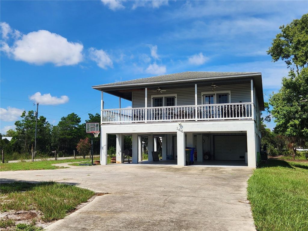 Photo of 144 Highlands Lake Drive, Lake Placid, FL 33852 (MLS # C7514167)