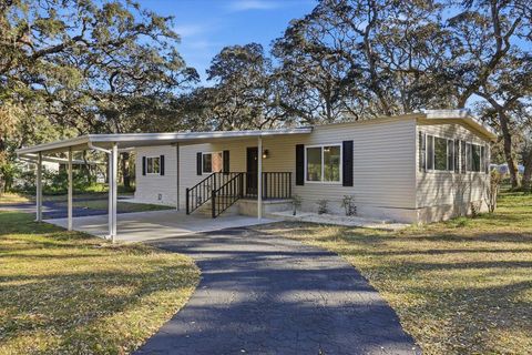 Photo of 100 Kostka Drive, Brooksville, FL 34604 (MLS # TB8470457)