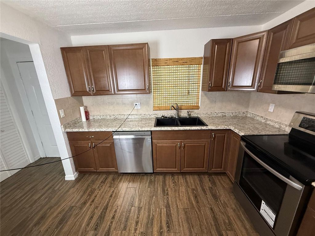 Photo of 14421 Americana Circle #103, Tampa, FL 33613 (MLS # TB8424084)
