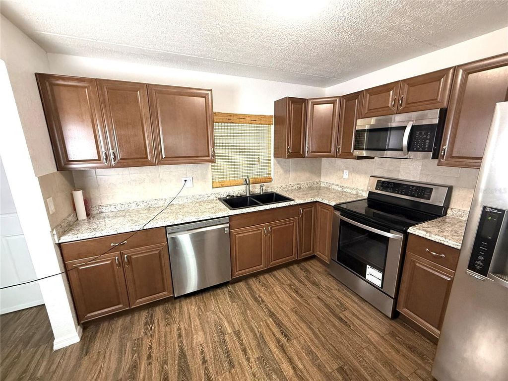 Photo of 14421 Americana Circle #103, Tampa, FL 33613 (MLS # TB8424084)
