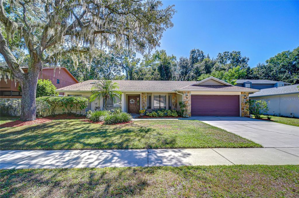 Photo of 6011 Soaring Avenue, Temple Terrace, FL 33617 (MLS # TB8435602)