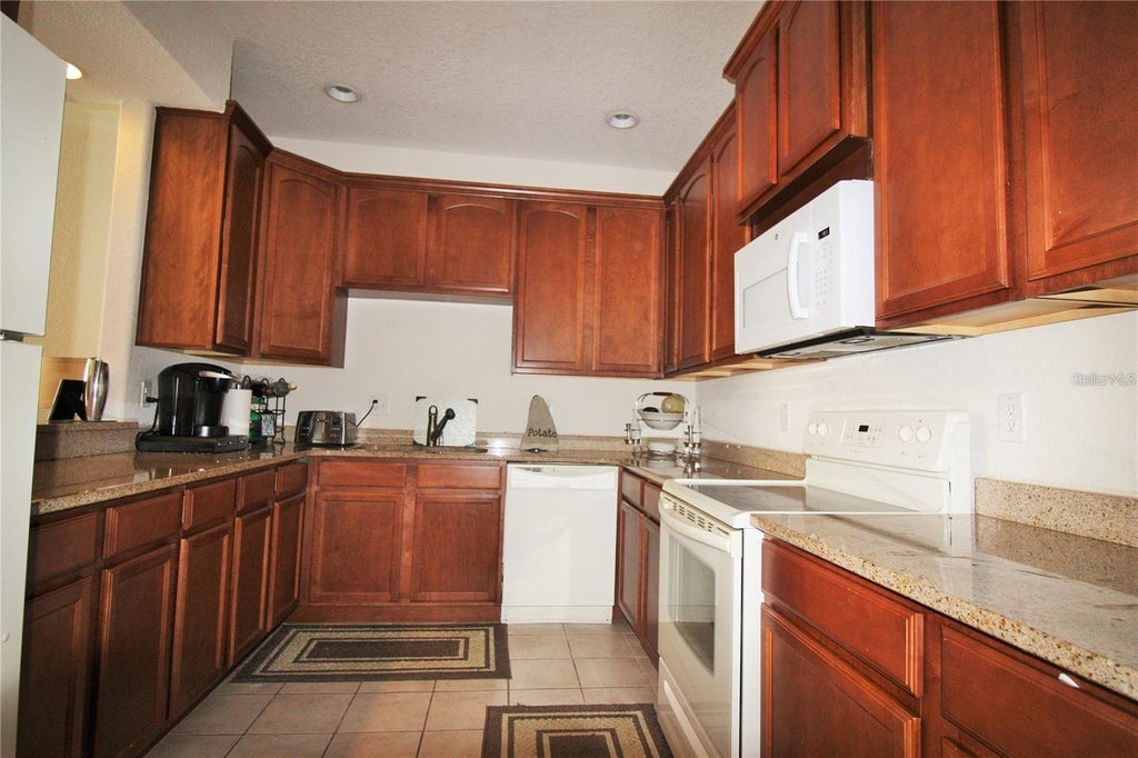 Photo of 17409 Promenade Drive, Clermont, FL 34711 (MLS # R4912066)