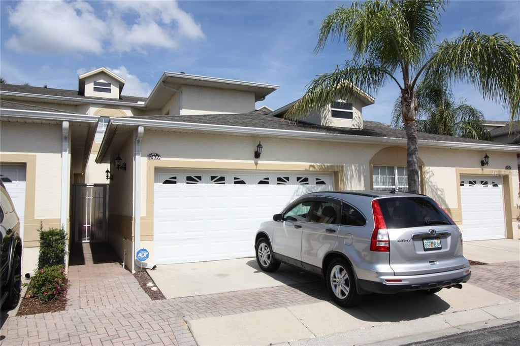 Photo of 17409 Promenade Drive, Clermont, FL 34711 (MLS # R4912066)