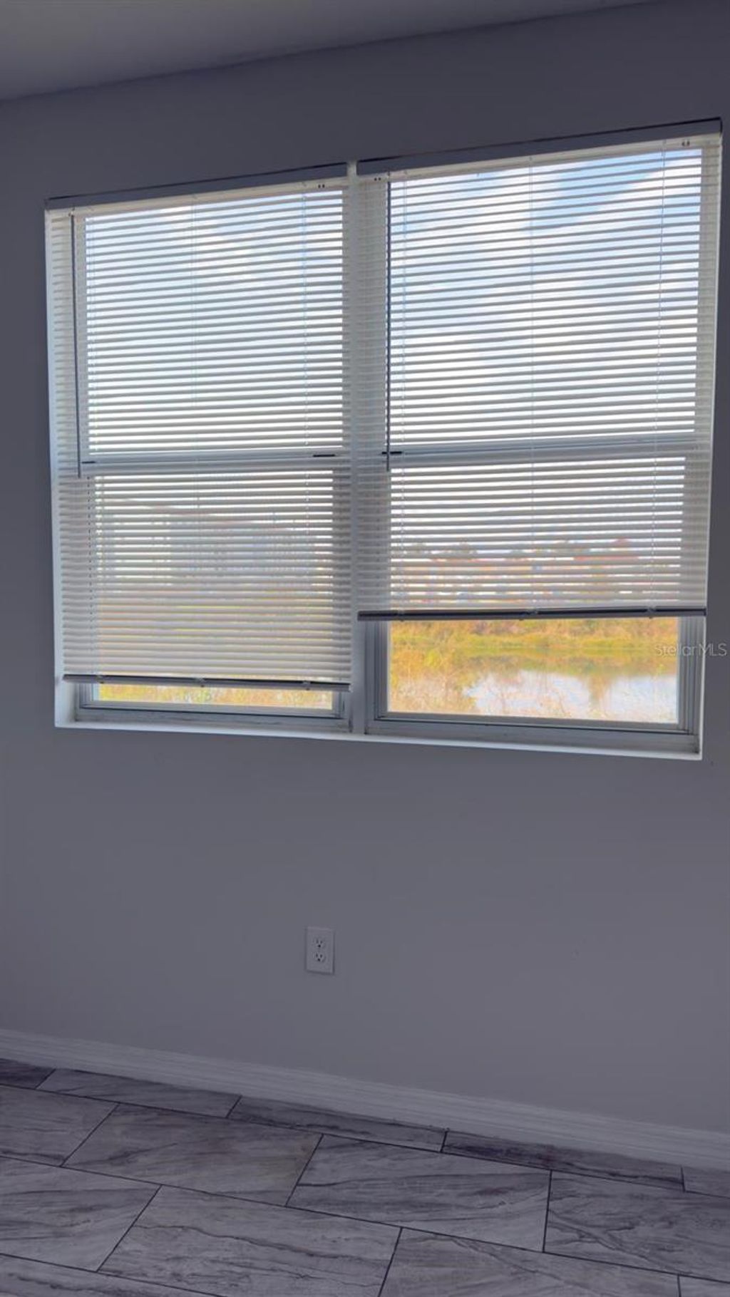 Photo of 751 Isaacville Drive #107, Orlando, FL 32809 (MLS # O6371937)