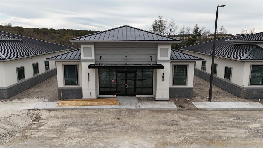 Under Construction. Building #11 is available for purchase at Lake Carter Exchange, a distinguished mixed-use development in Apopka’s East Shore at the intersection of Ocoee-Apopka Road and W Keene Road. This dark gray shell building is ideal for medical or professional offices, with potential for retail use based on buyer needs. The shell delivery offers full flexibility for custom interior design. The development is strategically located less than one mile from Advent Health’s seven-story, 120-bed hospital and opposite a new Publix Supermarket development. Situated in the vibrant East Shore trade area, which includes 5,000 planned residences and an average household income above $100k, this Class A property is perfectly positioned for businesses targeting growth in Central Florida’s second-fastest-growing city. Contact us for pricing details/incentives and to schedule a tour of this exceptional commercial opportunity.