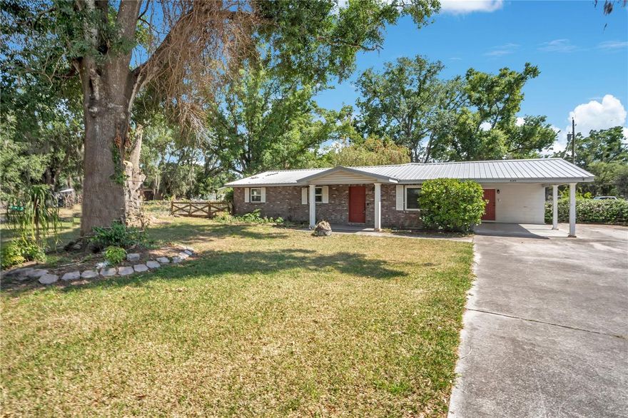 One or more photo(s) has been virtually staged. Nestled on a beautifully shaded 1-acre corner lot in the sought-after Cork area of north Plant City, this well-maintained 3 bedroom, 2 bath ranch home offers the perfect blend of country charm and modern updates with no HOA, no deed restrictions, and no CDD! Surrounded by mature oak trees and fully fenced in the back, the property provides space, privacy, and flexibility for your lifestyle. Inside, you’ll find 1,676 square feet of comfortable living space along with numerous major improvements, including a metal roof, tankless water heater, updated electrical panel and wiring, and re-plumbed bathrooms—all completed in 2014. New Pella double-pane, impact-resistant windows with a 25-year warranty were installed in 2022, and the primary shower was remodeled in 2023. Additional updates include a new well pump and pressure tank in 2022 and septic tank service in 2024 for added peace of mind. The impressive 24’x36’ storage shed offers abundant room for hobbies, equipment, or workspace, and the yard features three electric ports for added convenience. Enjoy the quiet rural feel while remaining close to shopping, schools, churches, and interstate access. Best of all, this property is eligible for 100% USDA financing with no down payment for qualified buyers!