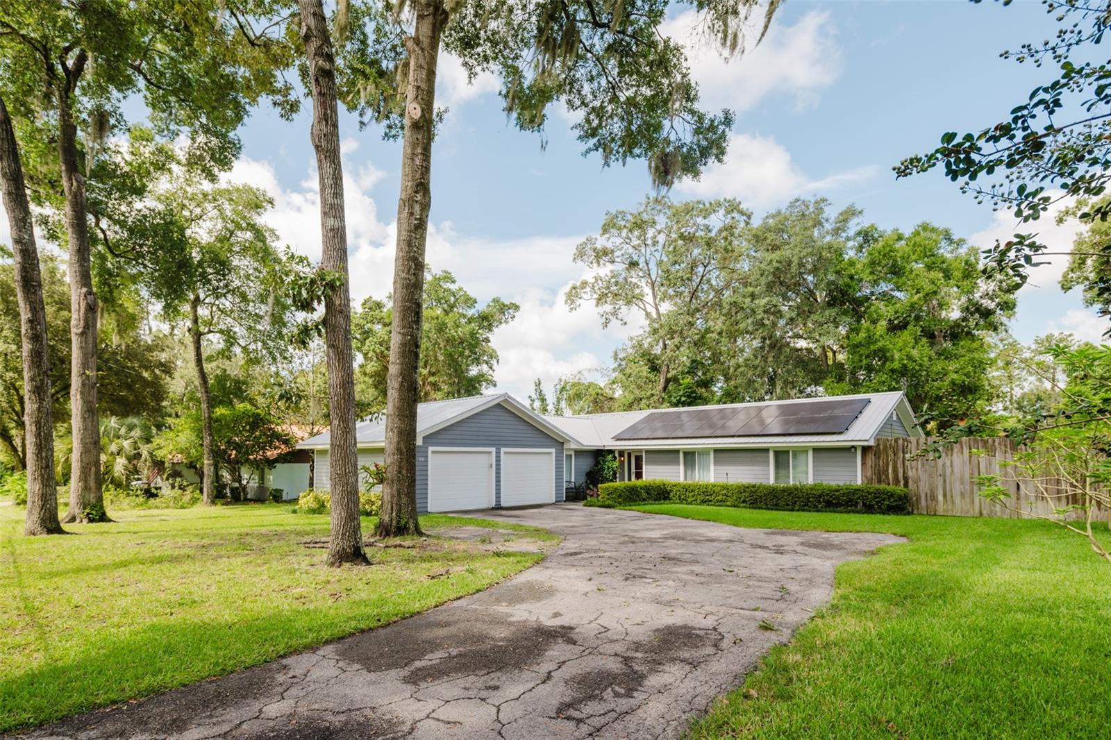 Discover this beautifully cared-for home featuring 3 spacious bedrooms,2 full baths plus a bonus room pool home that comes with a blend of comfort and style. Located in a highly desired school district and just minutes from downtown Ocala, shopping, dining, Silver Springs State Park for kayaking, the YMCA, Jarvey Gant Park, and all the amenities you need. This lovely home has updates started: Master bath 2025, wood deck 2025, Solar panels 2022, windows, door and slider 2015, metal roof 2017 Fireplace and living room flooring 2015 and more. This Ocala gem is ready to welcome you home!