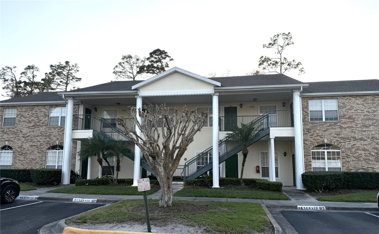 Discover this beautifully maintained 2 bedroom, 2 bathroom , second floor end unit condo, offering high ceilings and an open airy feel. The condo boasts ceramic tile flooring throughout, combining durability with easy maintenance. The kitchen is a chef's delight with plenty of cabinet space and a closet pantry. The master bedroom features a private bathroom and a spacious walk-in closet, providing comfort and convenience. Enjoy the ease of an in-unit washer and dryer, along with all included appliances, making this condo truly move-in ready. Step outside to the screened-in private balcony, where you can unwind while enjoying serene wooded views. A storage closet on the balcony adds extra convenience. The condo fee also includes water, sewer and garbage. Located close to the University of Central Florida, this condo offers easy access to a vibrant array of shopping, dining, and entertainment options. The nearby Waterford Lakes Town Center provides a variety of retail stores and eateries. Come see it today!