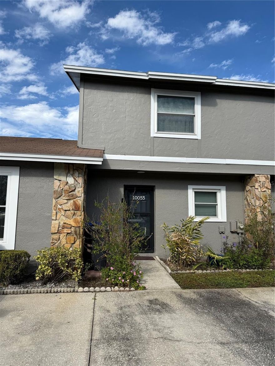 This furnished townhome in the desirable Carrollwood Oaks community offers a comfortable and convenient living experience with two bedrooms and two and a half bathrooms. The open-concept living space downstairs features a spacious living and dining area, a well-appointed kitchen, and a guest half bath, making it ideal for everyday living and entertaining. Upstairs are two large primary suites, each with its own private bathroom, providing excellent privacy and flexibility. Enjoy outdoor living on the covered, screened-in patio, perfect for relaxing at the end of the day. The home includes two side-by-side dedicated parking spots in the driveway, and residents have access to a community pool. Washer and dryer included. Conveniently located near shopping, dining, and major roadways, this move-in-ready home combines comfort, functionality, and location.