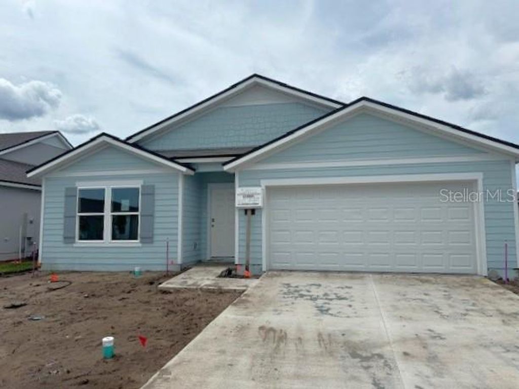 Photo of 61 Hulett Woods Road S, Palm Coast, FL 32137 (MLS # FC301594)