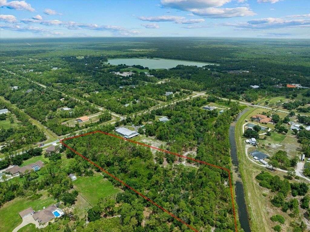 Photo of N Chamberlain Boulevard, North Port, FL 34286 (MLS # N6144975)