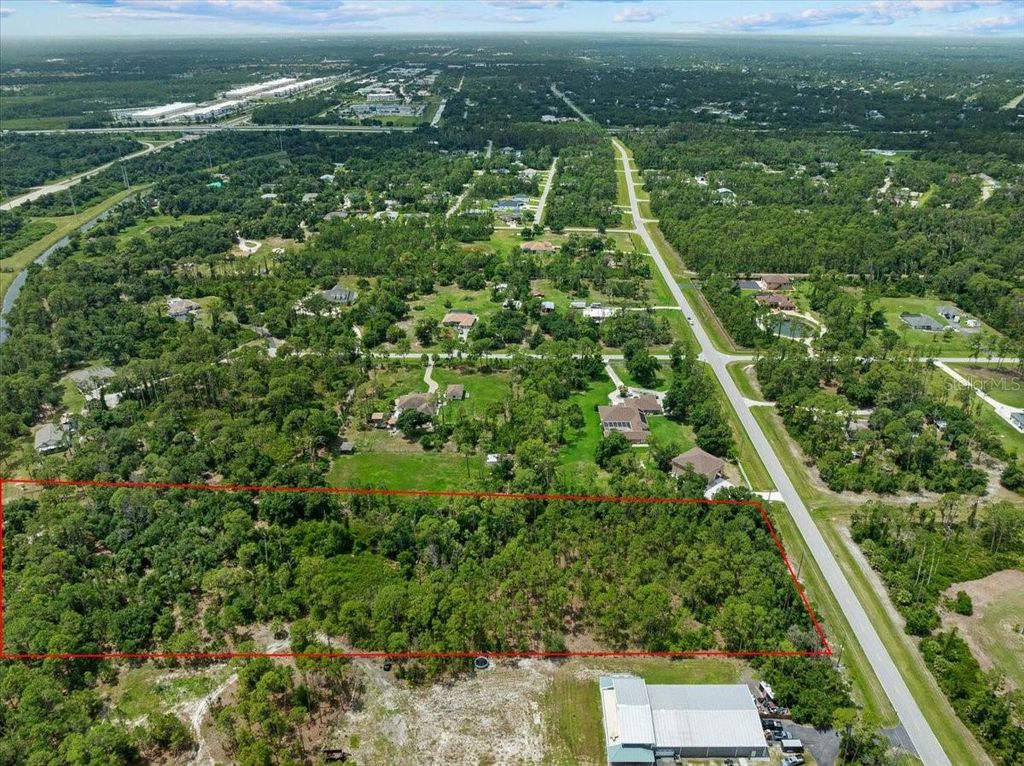 Photo of N Chamberlain Boulevard, North Port, FL 34286 (MLS # N6144975)