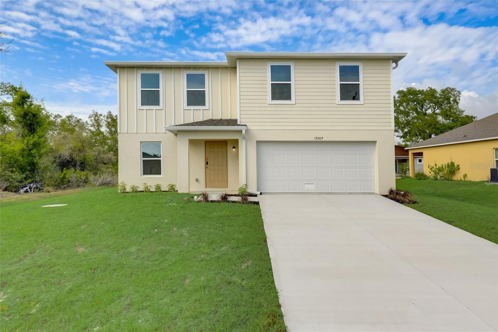 Begin your next chapter in this stunning new construction home located in charming Port Charlotte! This modern residence features a spacious open-concept design that seamlessly integrates a gourmet kitchen with the Great Room and dining area. The kitchen boasts refined cabinetry, granite countertops, and stainless steel appliances, including an electric smooth-top range, dishwasher, and over-the-range microwave—ideal for culinary enthusiasts.
The first floor also includes a chic powder room for guests. Upstairs, enjoy generously sized bedrooms with ample closet space and a primary suite with a private bath and expansive walk-in closet. Additional highlights include a second-floor walk-in laundry room and a 2-car garage. Energy-efficient Low-E insulated dual-pane windows and a one-year limited home warranty ensure comfort and peace of mind. Move-in Ready! No HOA! Seller Offering Concessions! Your dream home awaits!