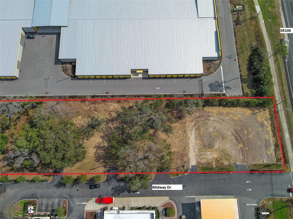 Photo of 2 Midway Drive, Palm Coast, FL 32164 (MLS # FC316219)