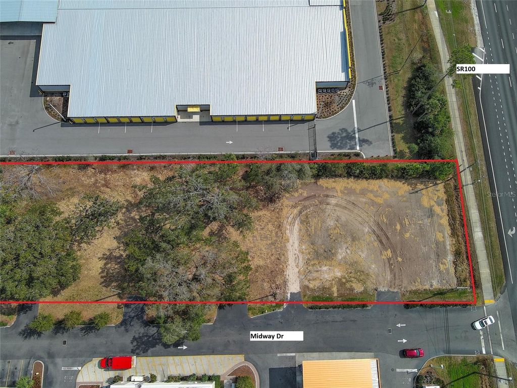 Photo of 2 Midway Drive, Palm Coast, FL 32164 (MLS # FC316219)