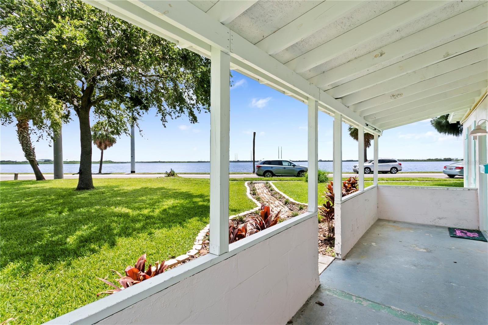 WATERFRONT RENTAL! Wake up to beautiful views of McKay Bay in this 1-bedroom, 1-bathroom waterfront apartment. Featuring some brand-new kitchen cabinets with a fresh coat of paint throughout, this home is perfect for anyone looking to enjoy both convenient location and life by the water. Mini-split A/C's, a metal roof, and all block construction for low utilities bills. Water and landscaping is included in the rent. The open-concept living space is filled with a ton of natural light, creating a bright and welcoming atmosphere. Whether you're sipping coffee in the morning or relaxing with a glass of wine in the evening, the scenic water views from your living room provide the perfect backdrop for every moment. Just 2 minutes to Ybor City, 6 minutes to Downtown Tampa, and close proximity to everything else Tampa Bay has to offer! Pets OK. Furnishings not included, Photos are for design ideas only, this is how a pest tenant had the place decorated.