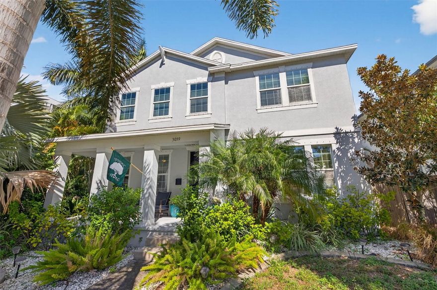 Located in the highly desirable Historic Kenwood neighborhood and safely nestled in a non-flood zone, this 2017-built block construction home delivers nearly 3,000 square feet of modern comfort and thoughtful design. Walking up to your front porch you are greeted by towering Royal Palms and a majestic Bismarck Palm, a true Florida paradise. 
Step inside to discover a layout that truly lives large. This home offers four spacious bedrooms, three full bathrooms, a huge upstairs bonus room that can easily convert into a fifth bedroom or office, a dedicated laundry room and a bright family room perfect for everyday living. The kitchen is the heart of the home with its generous walk-in pantry, dedicated coffee bar and an oversized island. The kitchen has an open flow to the living and dining areas which makes this layout an entertainer's dreams come true. 
The primary suite is a true retreat with plenty of room for a king-size bed and dressers along with a massive walk-in closet measuring 17 by 8.5 feet. The ensuite bathroom is equally impressive with a double vanity, separate toilet room, walk-in shower, and relaxing soaking tub. This primary suite is separate from the other bedrooms allowing privacy and relaxation. 
Outside, the fully fenced backyard is built for Florida living with a huge paver patio, a covered porch with space for an outdoor TV, and tropical landscaping featuring more Royal Palms, lush Areca palms, and plenty of room to add a pool and hot tub. Storage is no issue thanks to the detached two-car garage with epoxy floors plus two backyard sheds that offer even more space for tools, toys, or decorations. With paid-off solar panels, enjoy low monthly electric costs and energy-efficient living without sacrificing style or space. Two separate AC units help keep the home comfortable year-round. This home has an option to connect gas if desired. 
Located just steps from local favorites like Gateways Subs, PePe's Cantina, and The Study Wine & Bourbon Lounge nights out are made simple. Looking for a nice walking path, you’re a block from Seminole Park which is home to beloved Historic Kenwood neighborhood events throughout the year. This home blends community charm with modern convenience. Priced to sell and offering plenty of space, this is your chance to join one of St. Pete’s most vibrant and artistic neighborhoods.