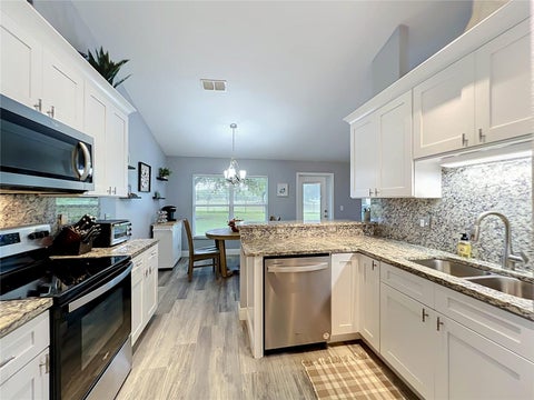 Tiny photo for 36700 Oconee Avenue, Eustis, FL 32736 (MLS # G5119364)