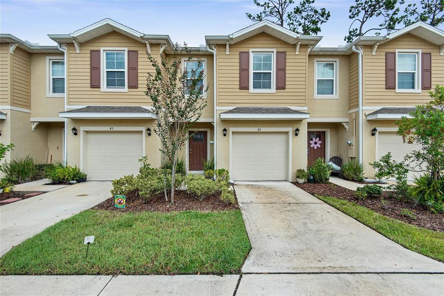 Modern Move-in Ready Townhome! Welcome to this stunning 2-story townhome built in 2022, perfectly combining modern style and everyday convenience. Located in the desirable Bella Oaks community of Port Orange, this home offers a quiet setting while being just minutes from shopping, schools, dining, and a short drive to the beach. The open-concept kitchen is a highlight, featuring granite countertops, Whirlpool stainless steel appliances, and sleek finishes that make cooking and entertaining effortless. Upstairs, the bedrooms are spacious and filled with natural light, creating the perfect retreat for rest and relaxation. Enjoy your morning coffee or evening unwind on the private deck located on the back of the townhome. Take advantage of stress-free ownership. The property is equipped with a security system, the garage comes with an electric charger, and the HVAC and kitchen equipment are only 3 years old. This beautifully maintained townhome offers the best of modern living in one of Port Orange’s most convenient and welcoming communities. Don’t miss your chance to make it yours!