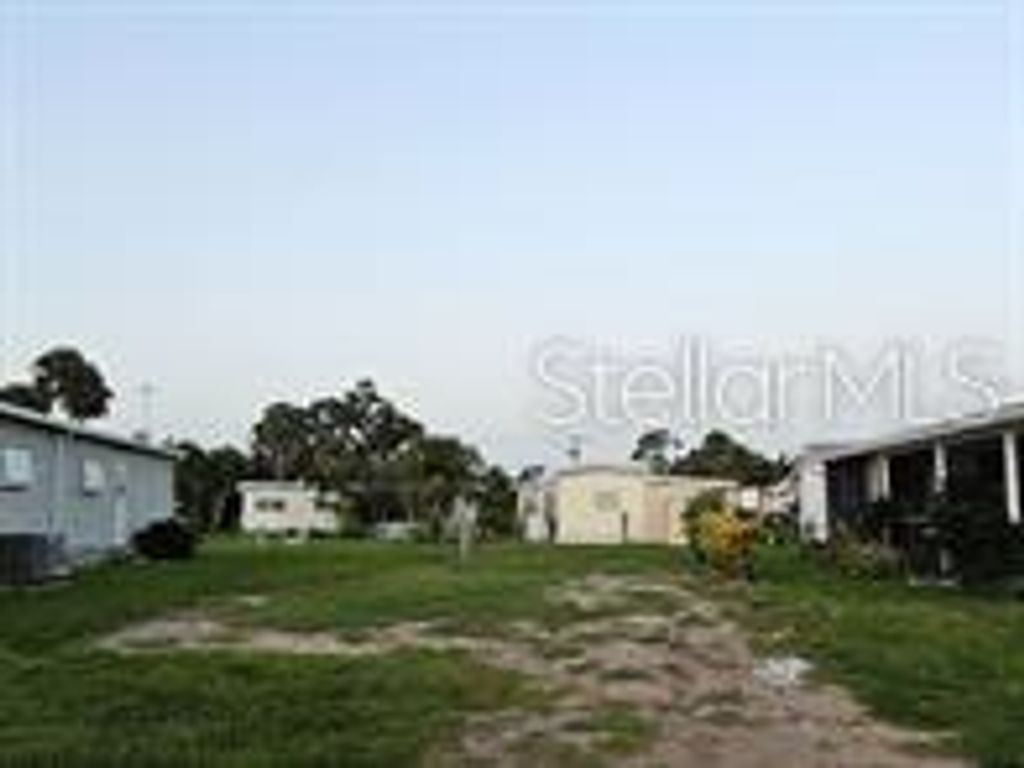 Photo of 5672 Holiday Park Boulevard, North Port, FL 34287 (MLS # C7508200)
